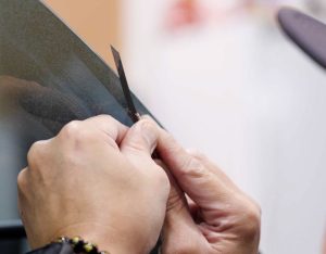 Removing car window tint in Pfafftown